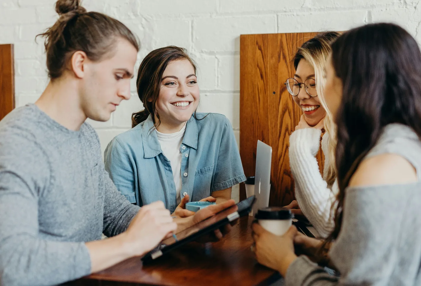 Creative team discussing ideas around a table